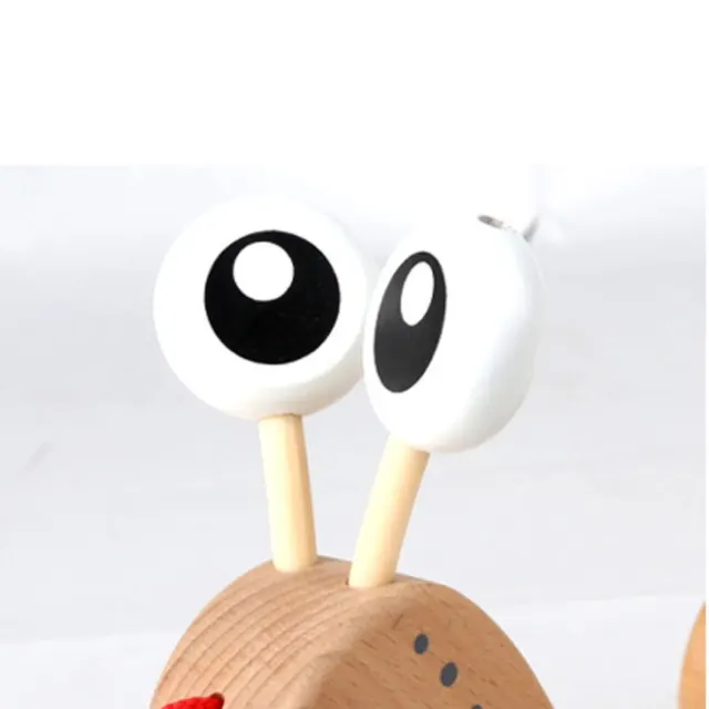 Игрушка каталка Улитка Hape — фото 7
